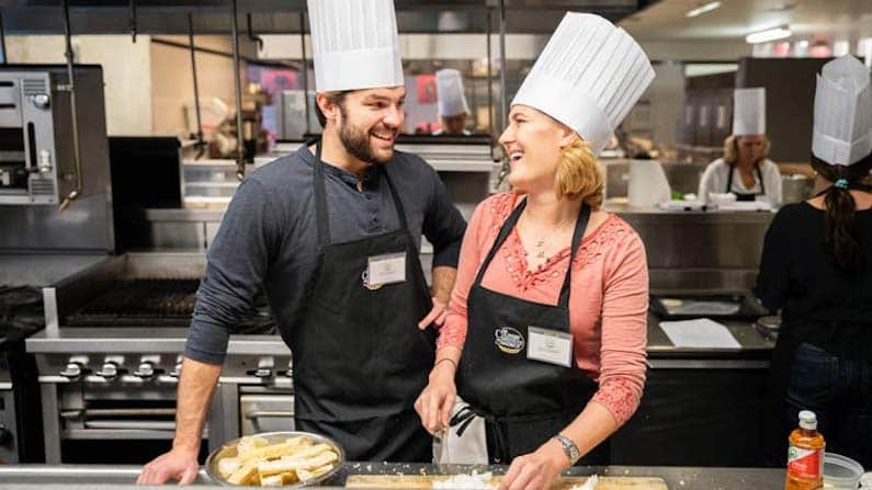 Two people at a cooking class in San Antonio