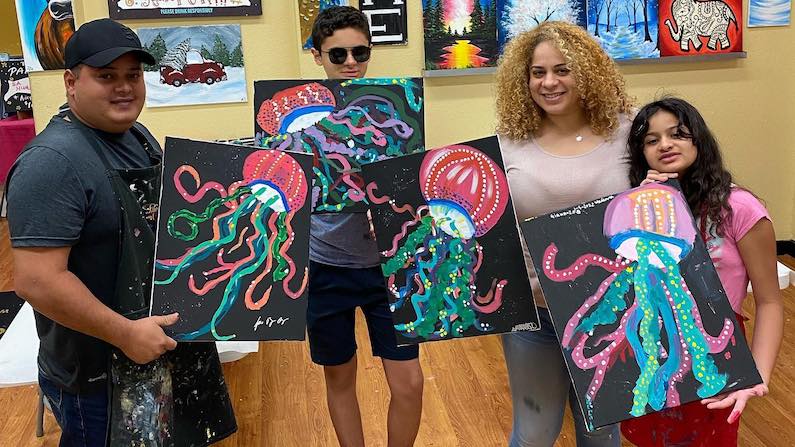 Family at Painting with a Twist in San Antonio