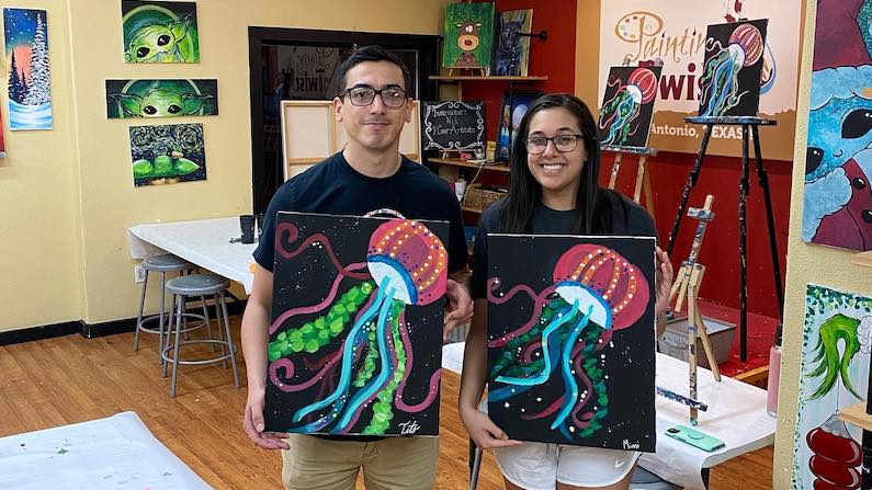 Man and Woman at Painting event in San Antonio