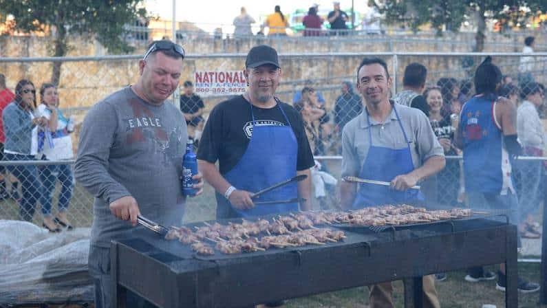 Three men grilling at Fiesta Oyster Bake